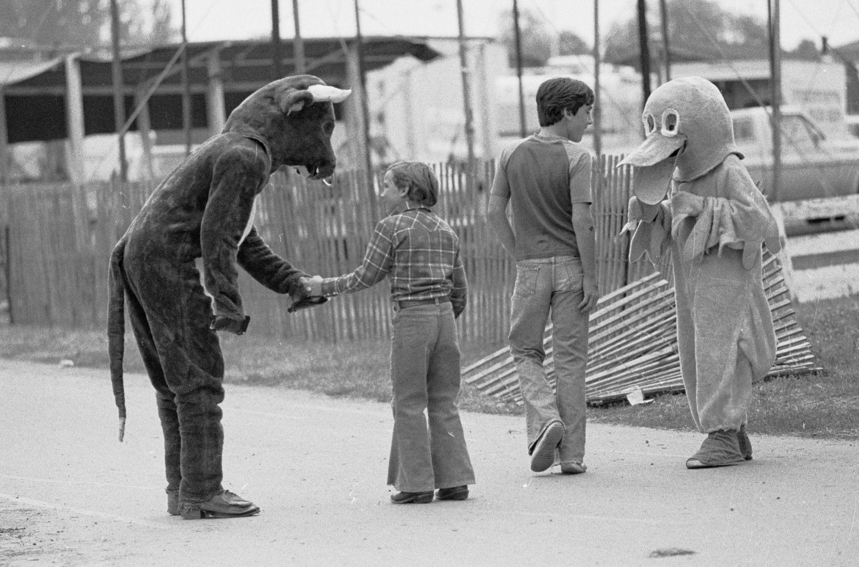 Fair mascots greet fairgoers, 1979